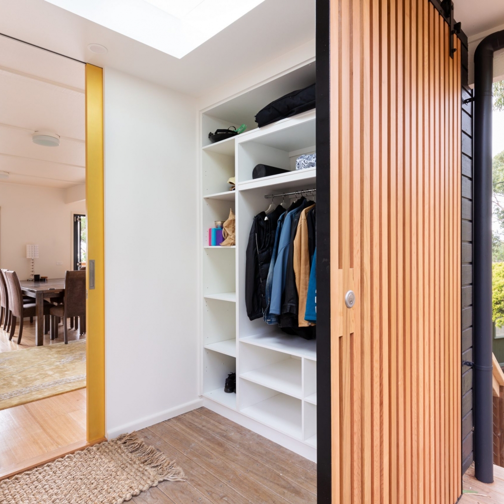 A beach house sand room with access from outside